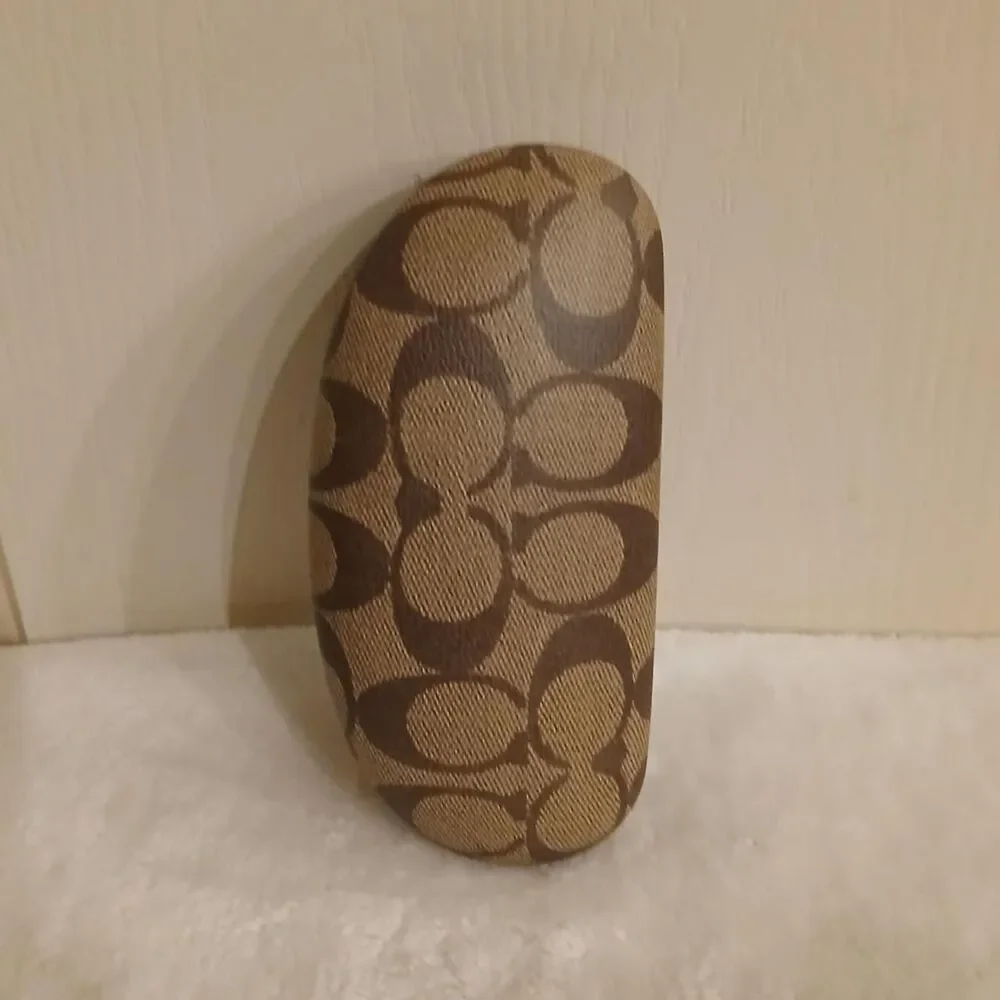 Coach clam-shell hard glasses case in brown and tan signature monogram canvas